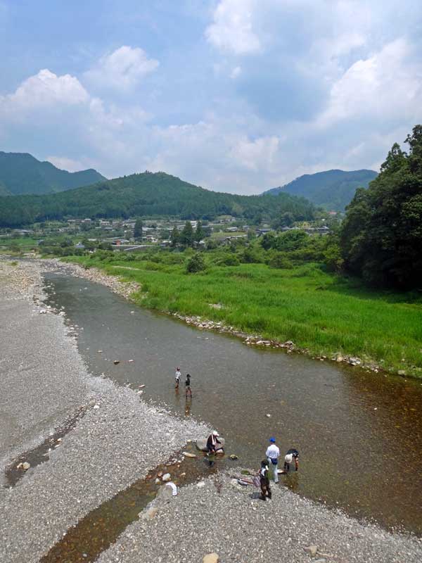 children play in Hiki river Chikatsuyu Japan
