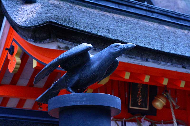  the signature raven statue at shrine representing Kumano Kodo